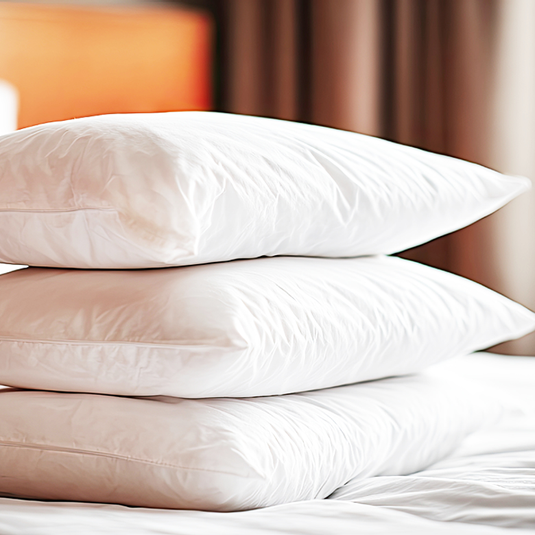 Afbeelding van Slaap je op je rug, buik of zij? Zo kies je het perfecte hoofdkussen voor jouw slaaphouding